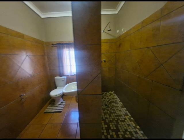 7 BEDROOM GUEST HOUSE FOR SALE IN DIBENG